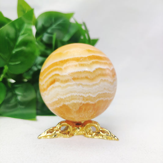 Yellow  Calcite Sphere with Raven Holder