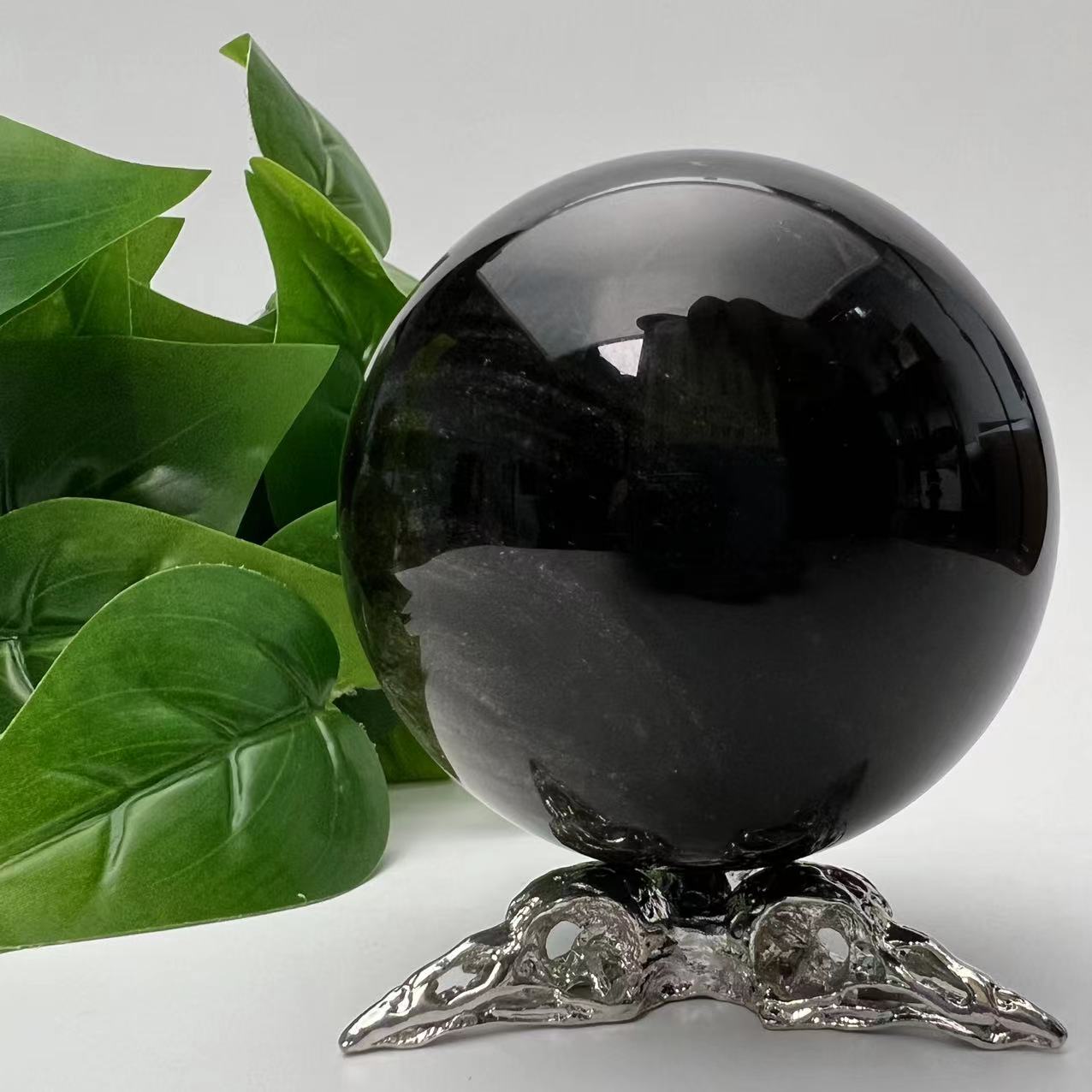 Golden Sheen Obsidian Sphere with Raven Holder