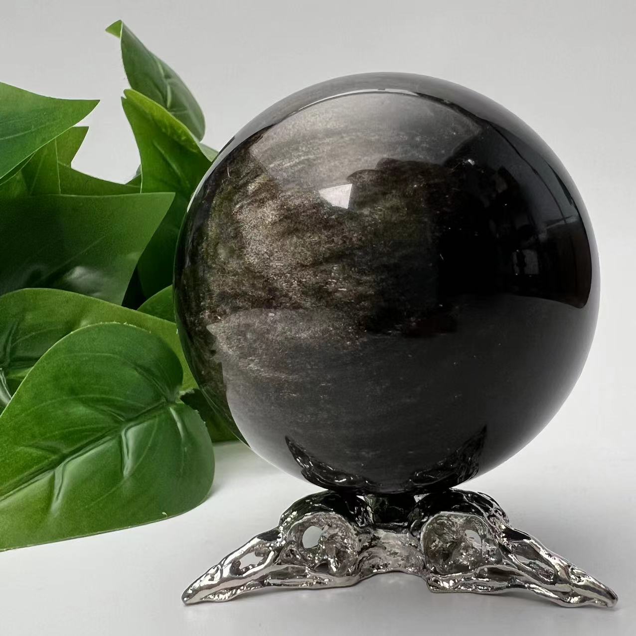 Golden Sheen Obsidian Sphere with Raven Holder